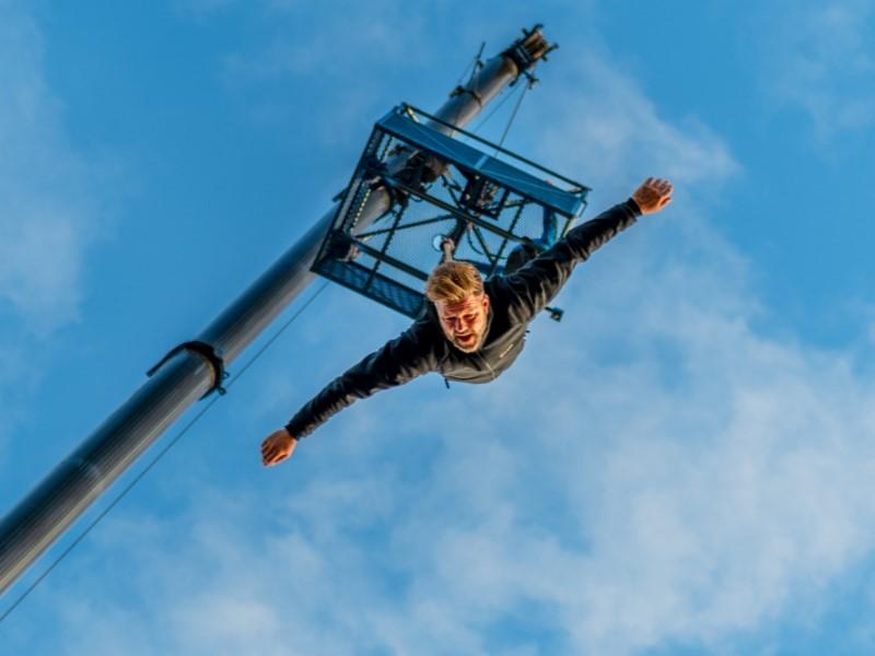 A thrill seeker hurtling towards the camera during a Bungee Jump