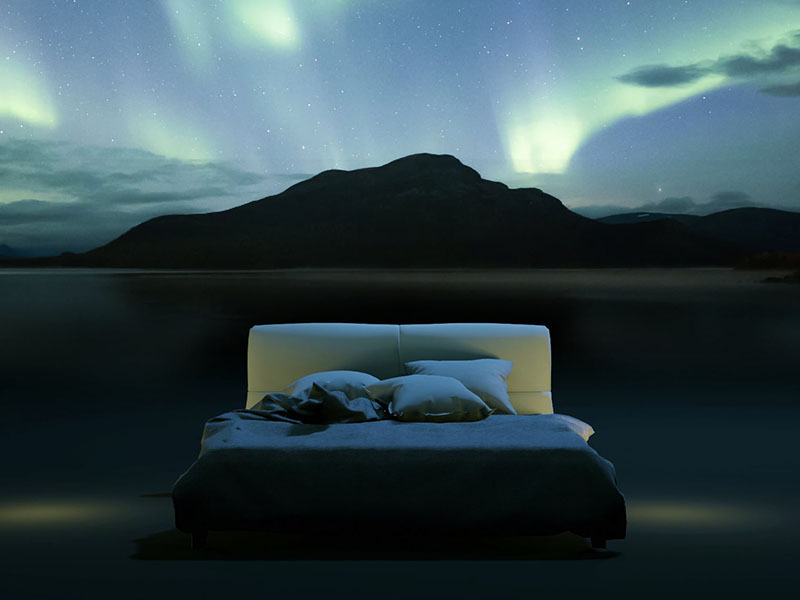 bed with mountain in background: promotional image for Portal: Esape into Nature mindfulness app