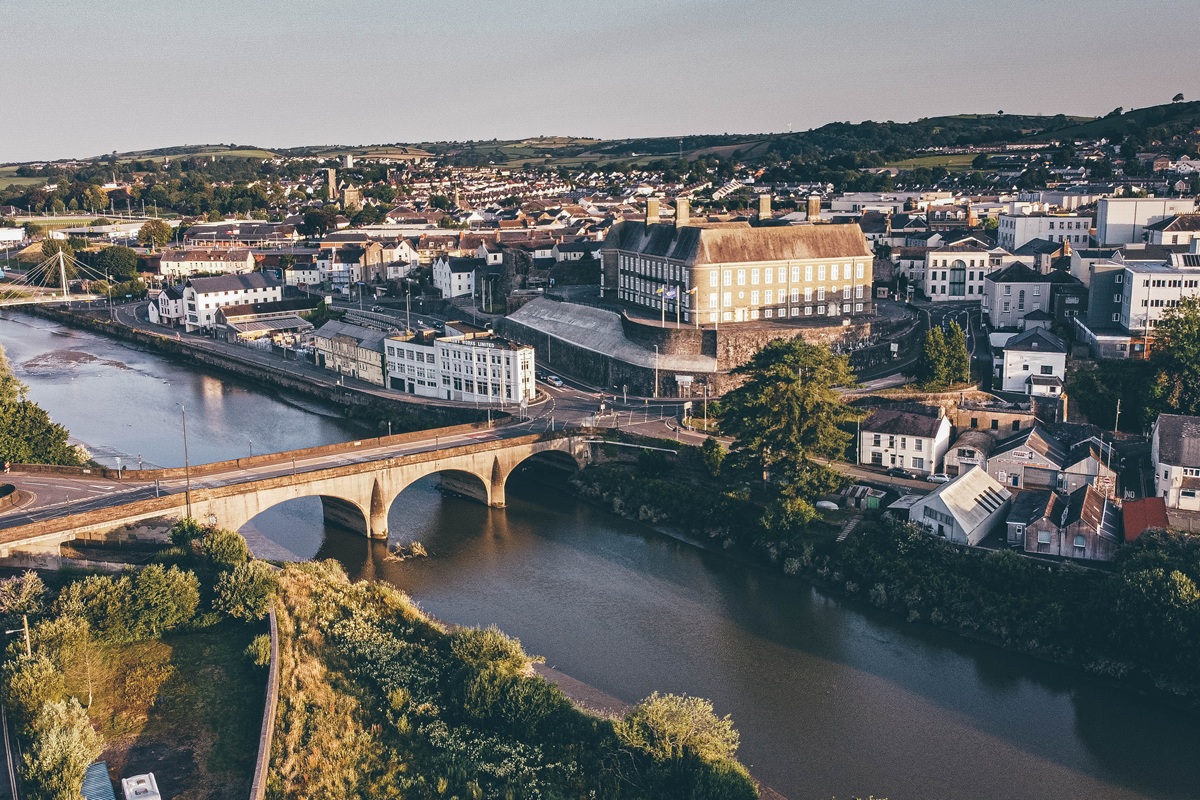Aerial shot of Carmarthen, with Carmarthenshire County Hall the focus in the centre of the image.