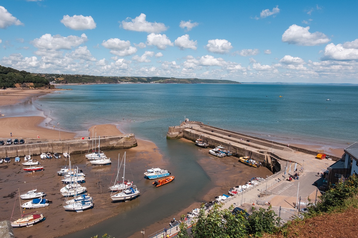 Saundersfoot beach with boats in the foreground.