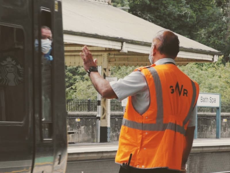 Platform staff and train