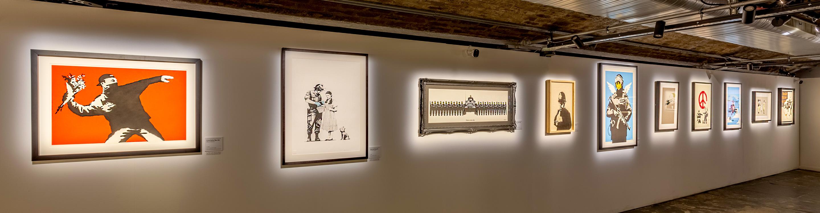 Photograph of works on display  the Art of Banksy Unauthorised exhibition in London