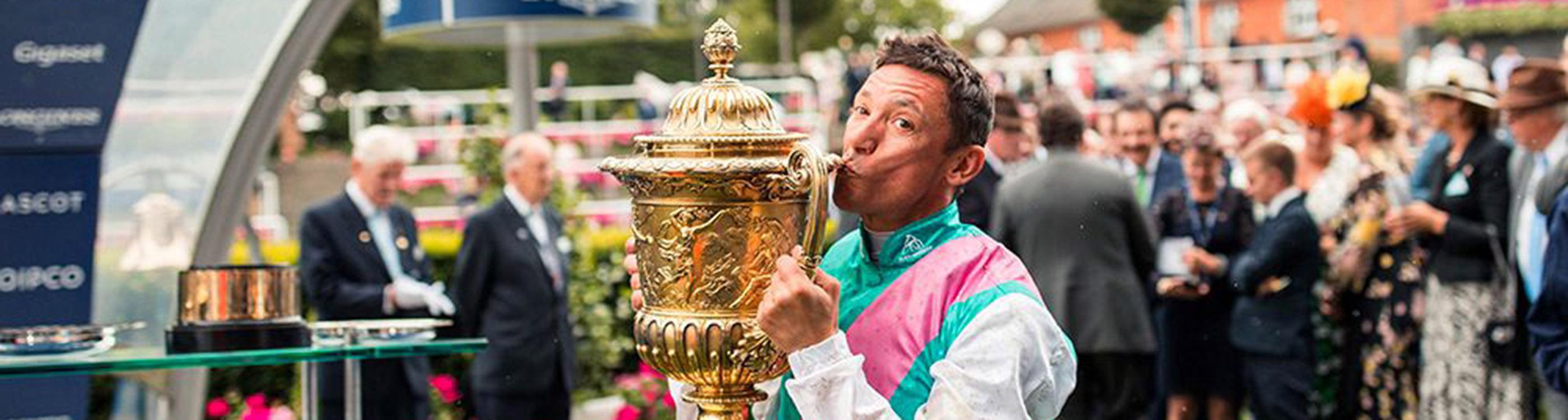 Winner kissing his trophy at the QIPCO King George Diamond Day