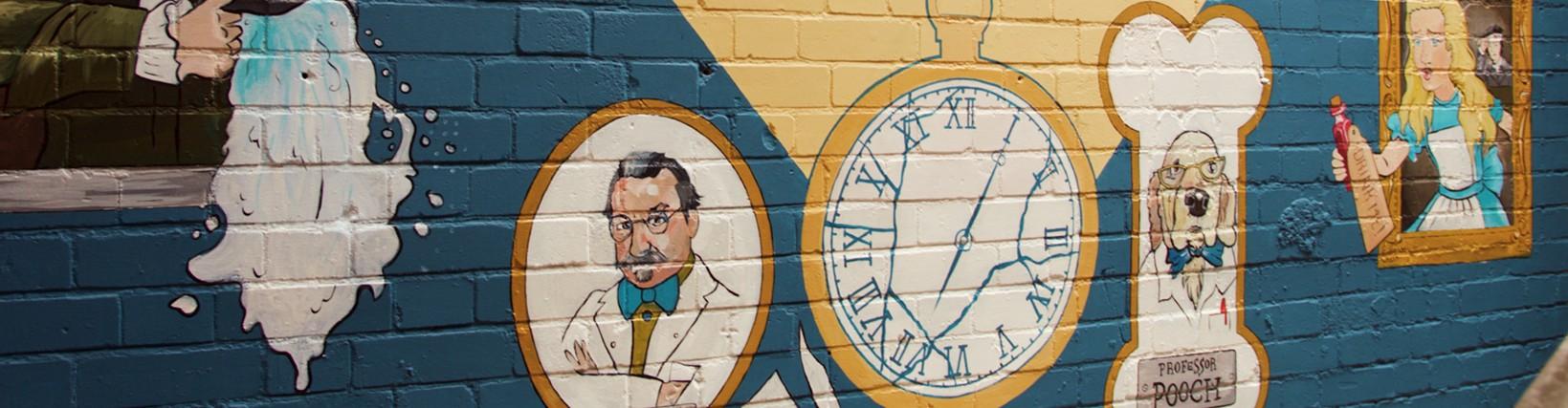 Photo of a mural of a broken watch