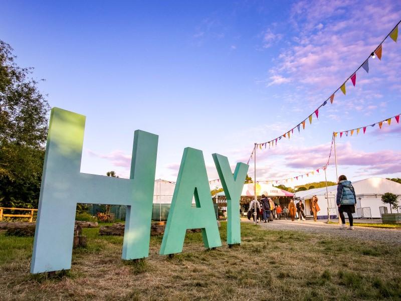A sign saying 'HAY' at the front of Hay Festival